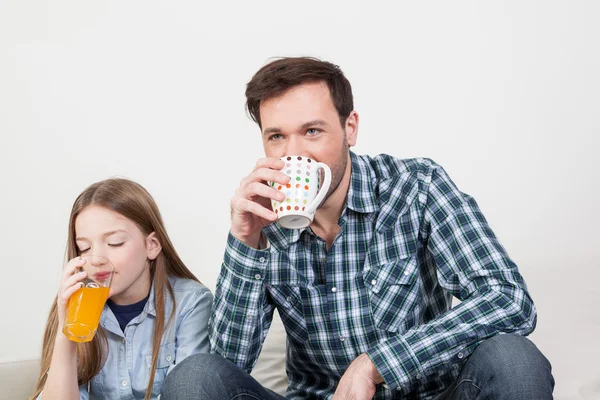 Girl with  father havinf breakfast — Stock Photo, Image