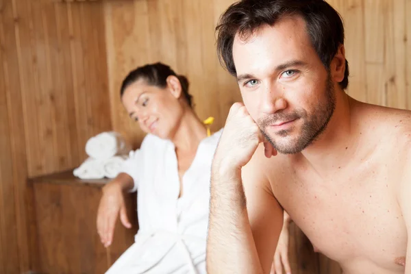 Couple ralaxing in sauna — Stock Photo, Image