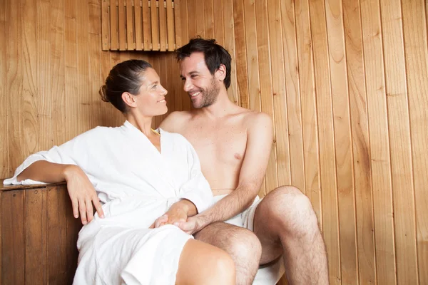 Couple ralaxing in sauna — Stock Photo, Image