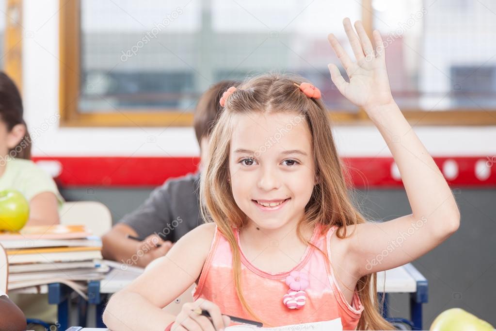 girl putting her hand up
