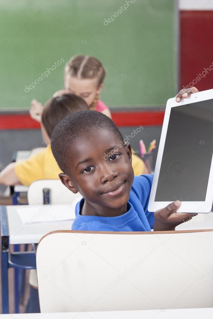 Boy showing the tablet