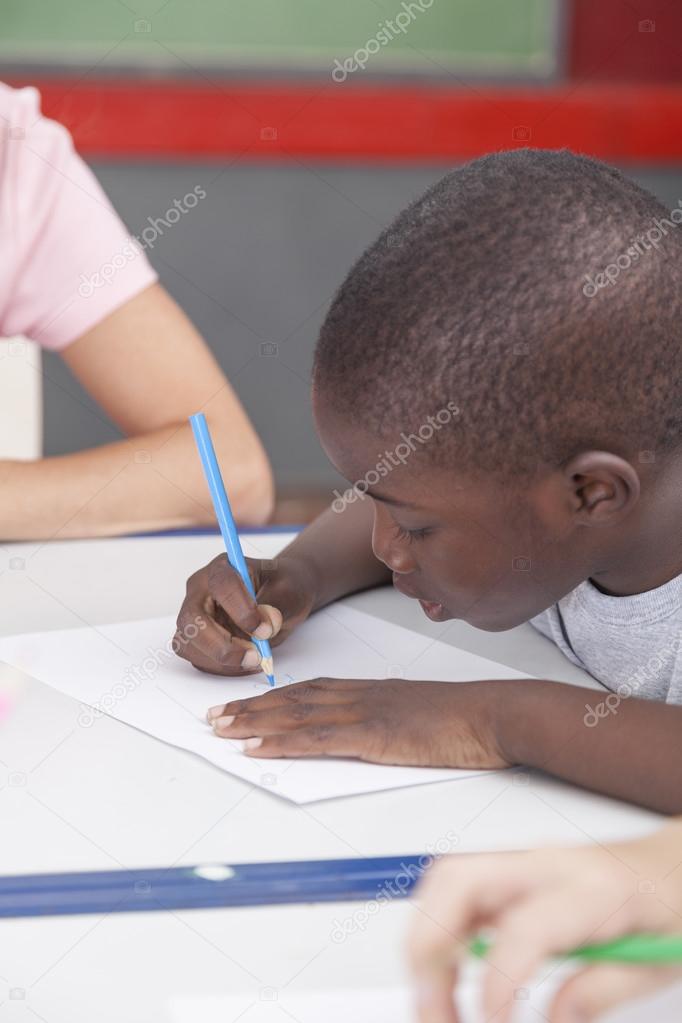 African boy drawing