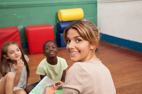 Kids reading a book — Stock Photo, Image