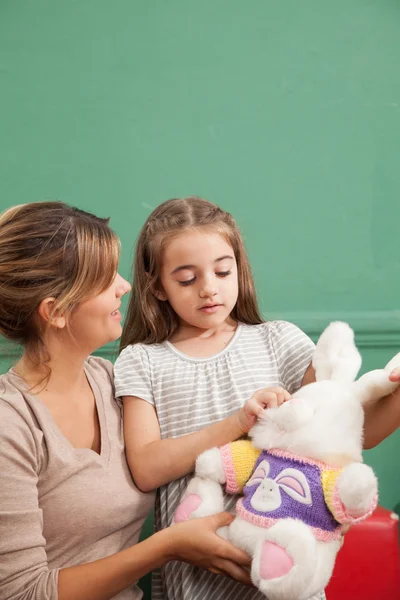 Girl playing with her teacher — Stock Photo, Image