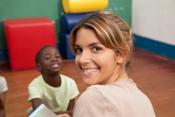 Kids reading a book — Stock Photo, Image