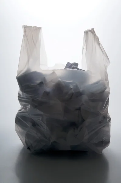 Saco de plástico com papel — Fotografia de Stock