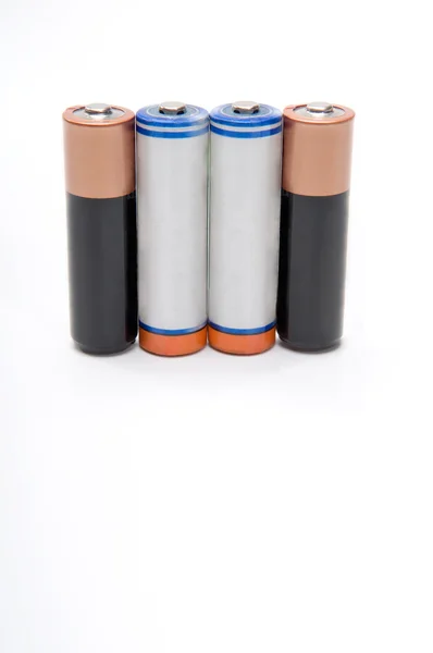 Quatro baterias usadas — Fotografia de Stock