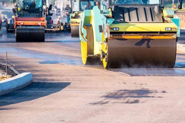 Road rollers working on the construction site