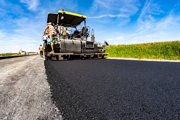 Rulli stradali che lavorano sul cantiere — Foto Stock