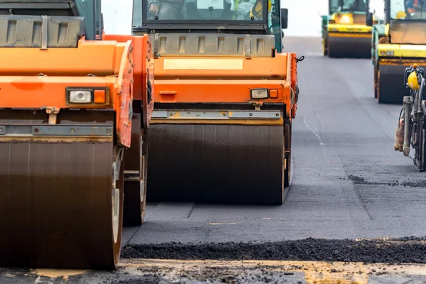 Road rollers working on the construction site