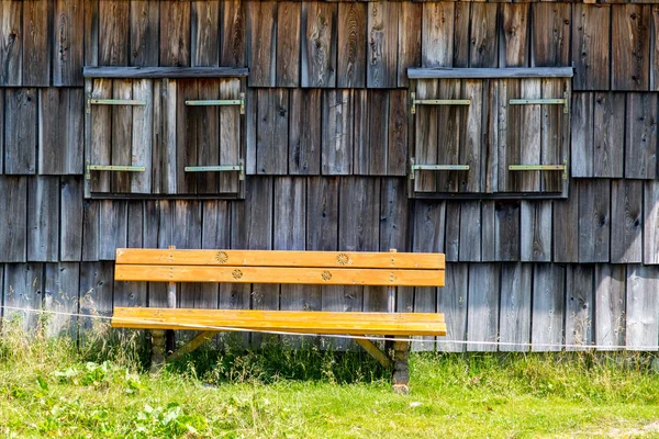 Bench in small village — Stock Photo, Image