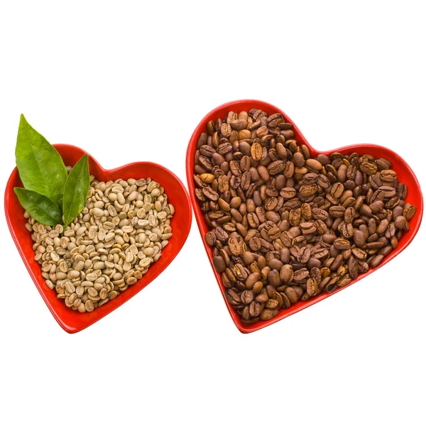 Roasted and green coffee beans in a bowls — Stock Photo, Image