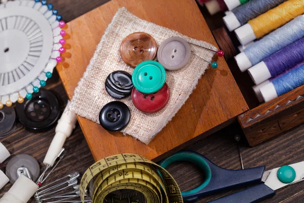 Vintage set of threads, scissors and buttons — Stock Photo, Image