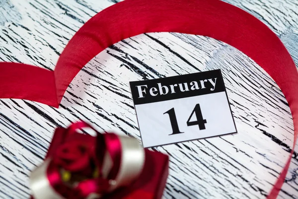 February 14 Valentines day - heart from red ribbon — Stock Photo, Image