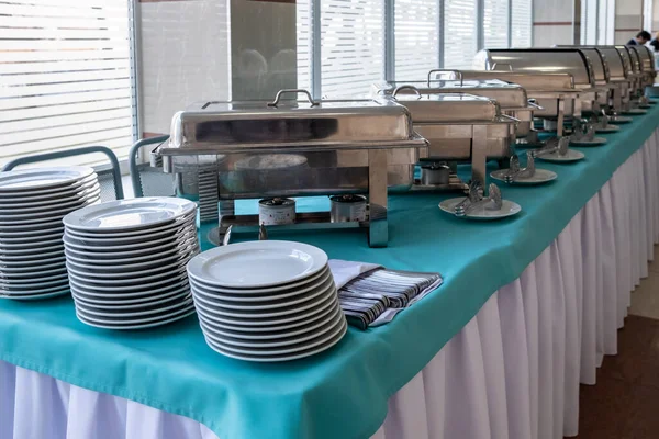 kitchen equipment on the table for a gourmet banquet or other service event.