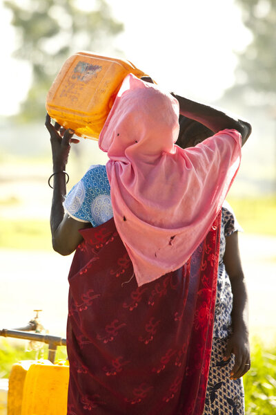 south sudanese woman drinking