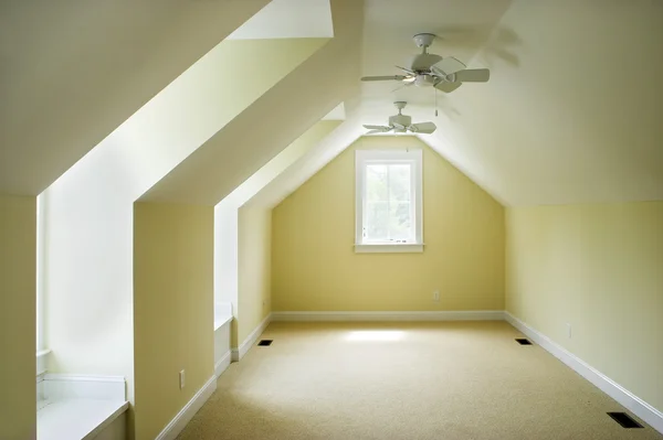 Empty attic bedroom — Stock Photo, Image