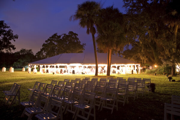 Reception tent surrounded by trees