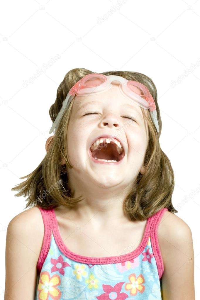 Little girl with goggles laughing