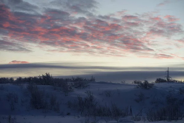 Zimní obloha s mraky při západu slunce — Stock fotografie