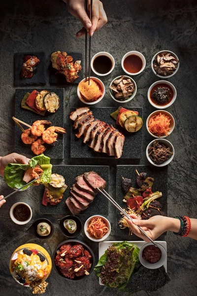 Flat Lay Two People Preparing Korean Barbecue Bites Someone Making — Stock Photo, Image