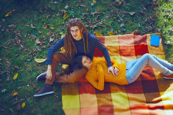 Pretty Young Couple Lying on on the Plaid, Autumn, Hugging Time, — Stock Photo, Image