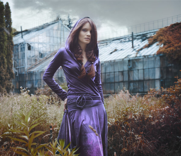Fashion model in garden in the hood, thick braids