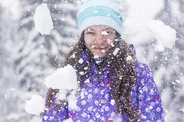 Winter woman portrait snow fall