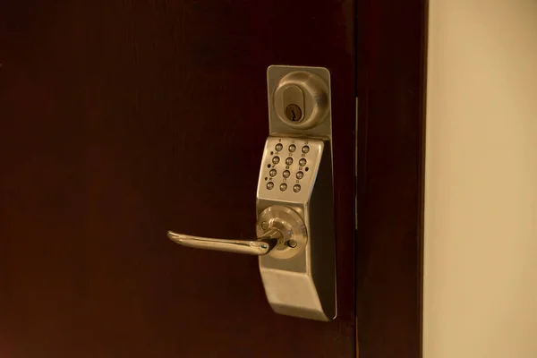 Digital door lock security system, Electronic door handle with key pads numbers. Selective focus