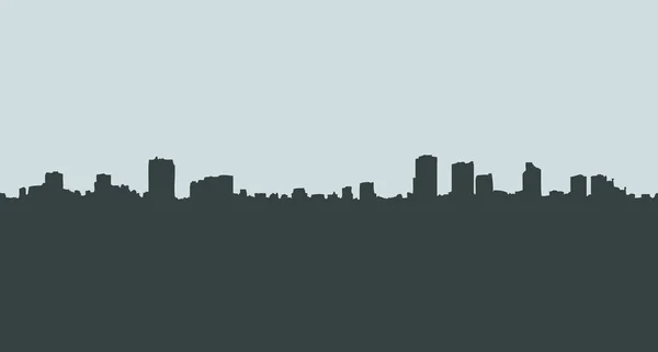 Silueta de edificios de la ciudad — Vector de stock