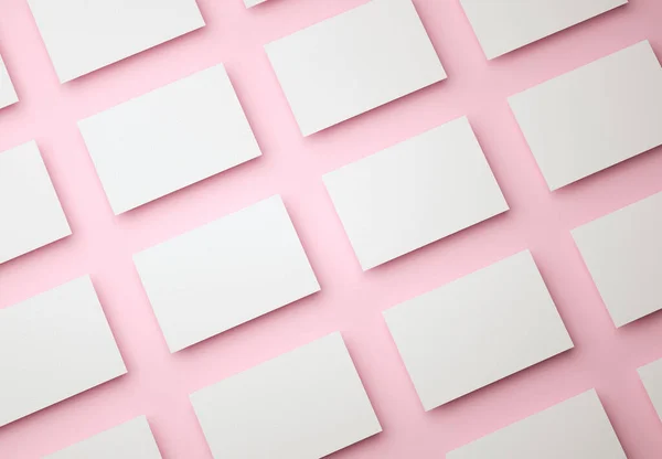 3d ілюстрація. Шаблон дизайну порожніх білих візиток на ізольованому рожевому фоні. Візитна картка для бізнесу та особистого користування . — стокове фото