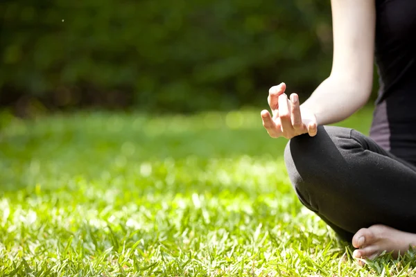 Young woman doing yoga exercises — Stock Photo, Image