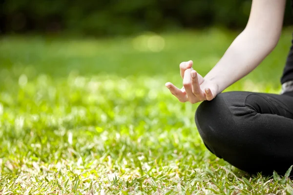 Young woman doing yoga exercises — Stock Photo, Image