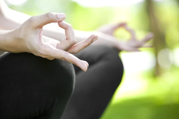 Young woman doing yoga exercises — Stock Photo, Image