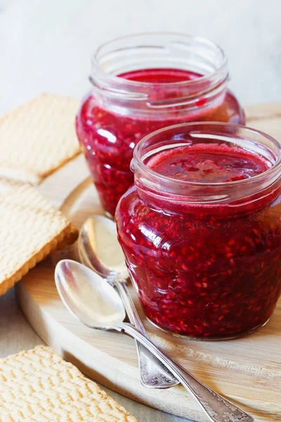 Raspberry jam in a glass jar — Stock Photo, Image