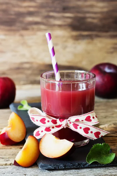 Delicious plum juice — Stock Photo, Image