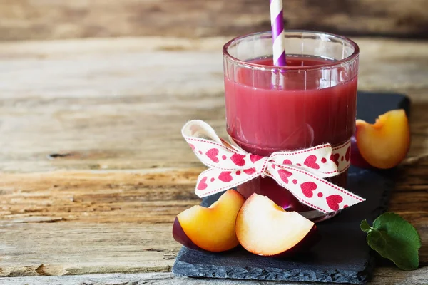 Delicious plum juice — Stock Photo, Image