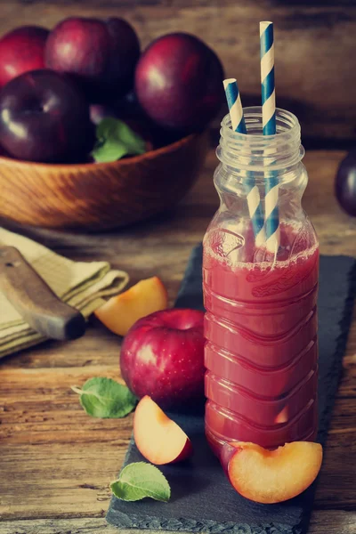 Delicious plum juice — Stock Photo, Image