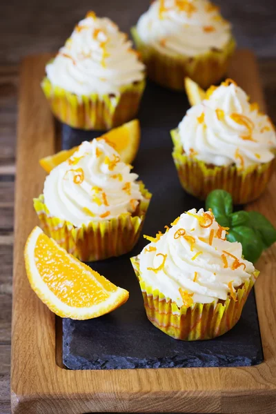Homemade cupcakes with oranges — Stock Photo, Image