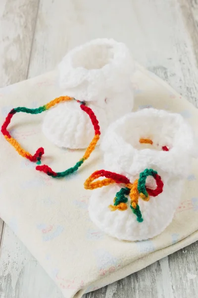 Knitted baby booties — Stock Photo, Image