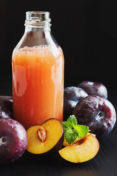 Plum juice — Stock Photo, Image