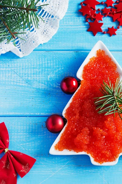 Red caviar on the christmas table — Stock Photo, Image