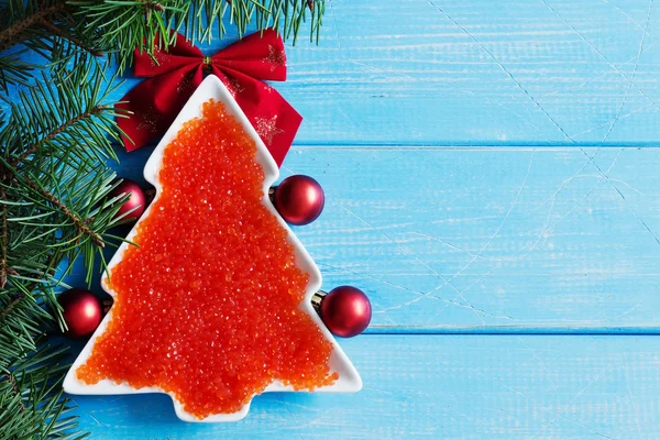 Red caviar on the christmas table — Stock Photo, Image