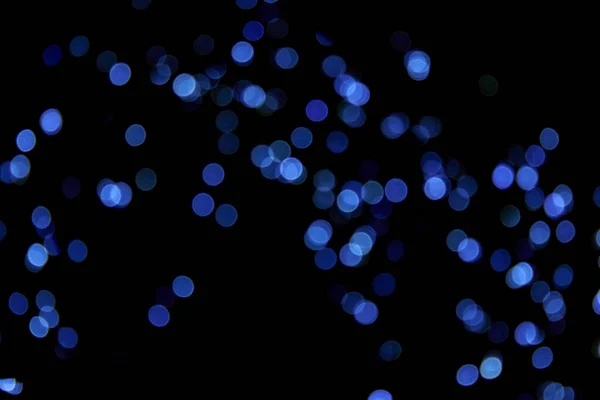 Defokussiert Bokeh Weihnachten Kleine Blaue Lichter Auf Schwarzem Hintergrund Verschwommene — Stockfoto