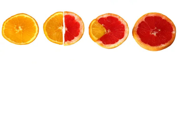 Cuatro rebanadas de pomelo y naranja —  Fotos de Stock