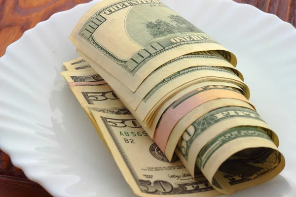 Close-up dollars on the plate — Stock Photo, Image