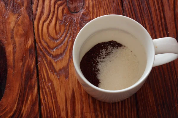 Tasse mit Kaffee und Zucker — Stockfoto