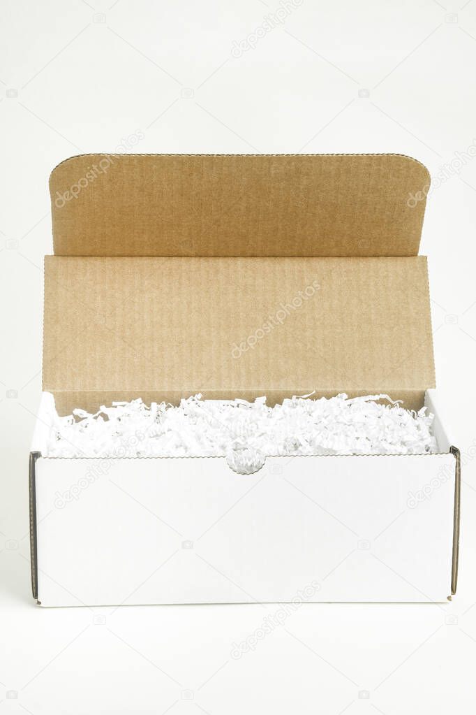 An open white rectangular cardboard packaging box set on plain white background.