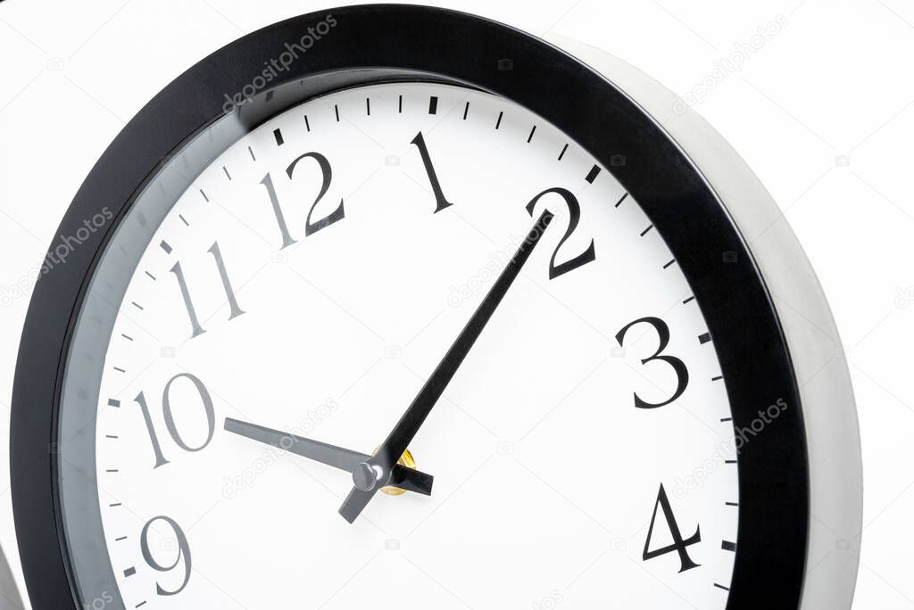 A creative macro shot of the face of an old, dirty, broken, and discarded plastic wall clock.