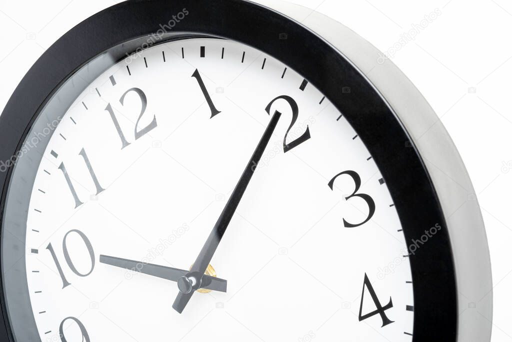 A creative macro shot of the face of an old, dirty, broken, and discarded plastic wall clock.